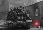Image of U.S. forces pass through wrecked town near end of World War II Gemunden Germany, 1945, second 26 stock footage video 65675069289