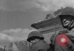 Image of U.S. forces pass through wrecked town near end of World War II Gemunden Germany, 1945, second 31 stock footage video 65675069289