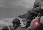Image of U.S. forces pass through wrecked town near end of World War II Gemunden Germany, 1945, second 32 stock footage video 65675069289