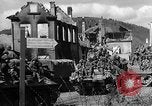 Image of U.S. forces pass through wrecked town near end of World War II Gemunden Germany, 1945, second 39 stock footage video 65675069289