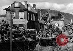 Image of U.S. forces pass through wrecked town near end of World War II Gemunden Germany, 1945, second 40 stock footage video 65675069289