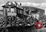 Image of U.S. forces pass through wrecked town near end of World War II Gemunden Germany, 1945, second 42 stock footage video 65675069289