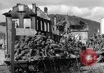 Image of U.S. forces pass through wrecked town near end of World War II Gemunden Germany, 1945, second 43 stock footage video 65675069289
