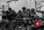 Image of U.S. forces pass through wrecked town near end of World War II Gemunden Germany, 1945, second 44 stock footage video 65675069289