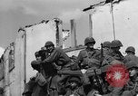Image of U.S. forces pass through wrecked town near end of World War II Gemunden Germany, 1945, second 46 stock footage video 65675069289