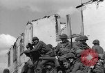 Image of U.S. forces pass through wrecked town near end of World War II Gemunden Germany, 1945, second 47 stock footage video 65675069289