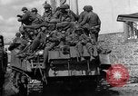 Image of U.S. forces pass through wrecked town near end of World War II Gemunden Germany, 1945, second 52 stock footage video 65675069289