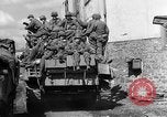 Image of U.S. forces pass through wrecked town near end of World War II Gemunden Germany, 1945, second 54 stock footage video 65675069289