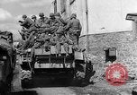 Image of U.S. forces pass through wrecked town near end of World War II Gemunden Germany, 1945, second 55 stock footage video 65675069289