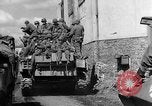 Image of U.S. forces pass through wrecked town near end of World War II Gemunden Germany, 1945, second 56 stock footage video 65675069289