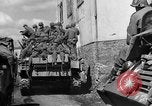 Image of U.S. forces pass through wrecked town near end of World War II Gemunden Germany, 1945, second 57 stock footage video 65675069289