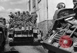 Image of U.S. forces pass through wrecked town near end of World War II Gemunden Germany, 1945, second 58 stock footage video 65675069289