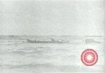 Image of Rope line rescue of landing craft on D-Day Normandy France, 1944, second 15 stock footage video 65675069372