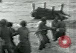 Image of Rope line rescue of landing craft on D-Day Normandy France, 1944, second 20 stock footage video 65675069372
