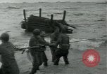 Image of Rope line rescue of landing craft on D-Day Normandy France, 1944, second 21 stock footage video 65675069372
