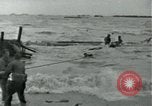 Image of Rope line rescue of landing craft on D-Day Normandy France, 1944, second 22 stock footage video 65675069372