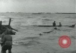Image of Rope line rescue of landing craft on D-Day Normandy France, 1944, second 25 stock footage video 65675069372