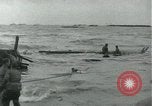 Image of Rope line rescue of landing craft on D-Day Normandy France, 1944, second 26 stock footage video 65675069372