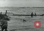Image of Rope line rescue of landing craft on D-Day Normandy France, 1944, second 27 stock footage video 65675069372