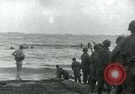 Image of Rope line rescue of landing craft on D-Day Normandy France, 1944, second 33 stock footage video 65675069372