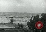 Image of Rope line rescue of landing craft on D-Day Normandy France, 1944, second 38 stock footage video 65675069372