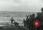 Image of Rope line rescue of landing craft on D-Day Normandy France, 1944, second 39 stock footage video 65675069372