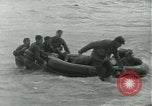 Image of Rope line rescue of landing craft on D-Day Normandy France, 1944, second 50 stock footage video 65675069372