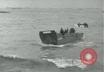 Image of Omaha Beach D-Day landing crafts Normandy France, 1944, second 18 stock footage video 65675069373