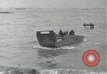 Image of Omaha Beach D-Day landing crafts Normandy France, 1944, second 19 stock footage video 65675069373