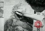 Immagine di Artista dipinge poster Chicago Illinois USA, 1918, secondo 61 filmato di repertorio 65675069483