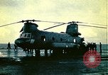 Image of VNAF helicopters on USS Midway during evacuation from Saigon South China Sea, 1975, second 1 stock footage video 65675069509