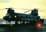 Image of VNAF helicopters on USS Midway during evacuation from Saigon South China Sea, 1975, second 6 stock footage video 65675069509