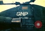 Image of VNAF helicopters on USS Midway during evacuation from Saigon South China Sea, 1975, second 7 stock footage video 65675069509