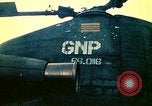 Image of VNAF helicopters on USS Midway during evacuation from Saigon South China Sea, 1975, second 9 stock footage video 65675069509