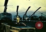 Image of VNAF helicopters on USS Midway during evacuation from Saigon South China Sea, 1975, second 16 stock footage video 65675069509