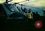 Image of VNAF helicopters on USS Midway during evacuation from Saigon South China Sea, 1975, second 25 stock footage video 65675069509