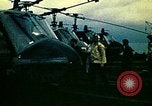 Image of VNAF helicopters on USS Midway during evacuation from Saigon South China Sea, 1975, second 26 stock footage video 65675069509