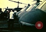 Image of VNAF helicopters on USS Midway during evacuation from Saigon South China Sea, 1975, second 31 stock footage video 65675069509