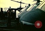 Image of VNAF helicopters on USS Midway during evacuation from Saigon South China Sea, 1975, second 32 stock footage video 65675069509