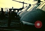 Image of VNAF helicopters on USS Midway during evacuation from Saigon South China Sea, 1975, second 33 stock footage video 65675069509