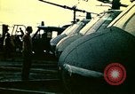 Image of VNAF helicopters on USS Midway during evacuation from Saigon South China Sea, 1975, second 34 stock footage video 65675069509