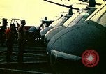 Image of VNAF helicopters on USS Midway during evacuation from Saigon South China Sea, 1975, second 37 stock footage video 65675069509