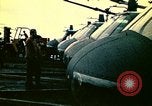 Image of VNAF helicopters on USS Midway during evacuation from Saigon South China Sea, 1975, second 38 stock footage video 65675069509
