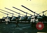 Image of VNAF helicopters on USS Midway during evacuation from Saigon South China Sea, 1975, second 41 stock footage video 65675069509