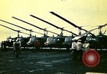 Image of VNAF helicopters on USS Midway during evacuation from Saigon South China Sea, 1975, second 43 stock footage video 65675069509