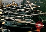 Image of VNAF helicopters on USS Midway during evacuation from Saigon South China Sea, 1975, second 46 stock footage video 65675069509