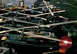 Image of VNAF helicopters on USS Midway during evacuation from Saigon South China Sea, 1975, second 48 stock footage video 65675069509