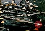 Image of VNAF helicopters on USS Midway during evacuation from Saigon South China Sea, 1975, second 49 stock footage video 65675069509