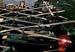 Image of VNAF helicopters on USS Midway during evacuation from Saigon South China Sea, 1975, second 50 stock footage video 65675069509