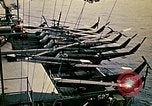 Image of VNAF helicopters on USS Midway during evacuation from Saigon South China Sea, 1975, second 53 stock footage video 65675069509